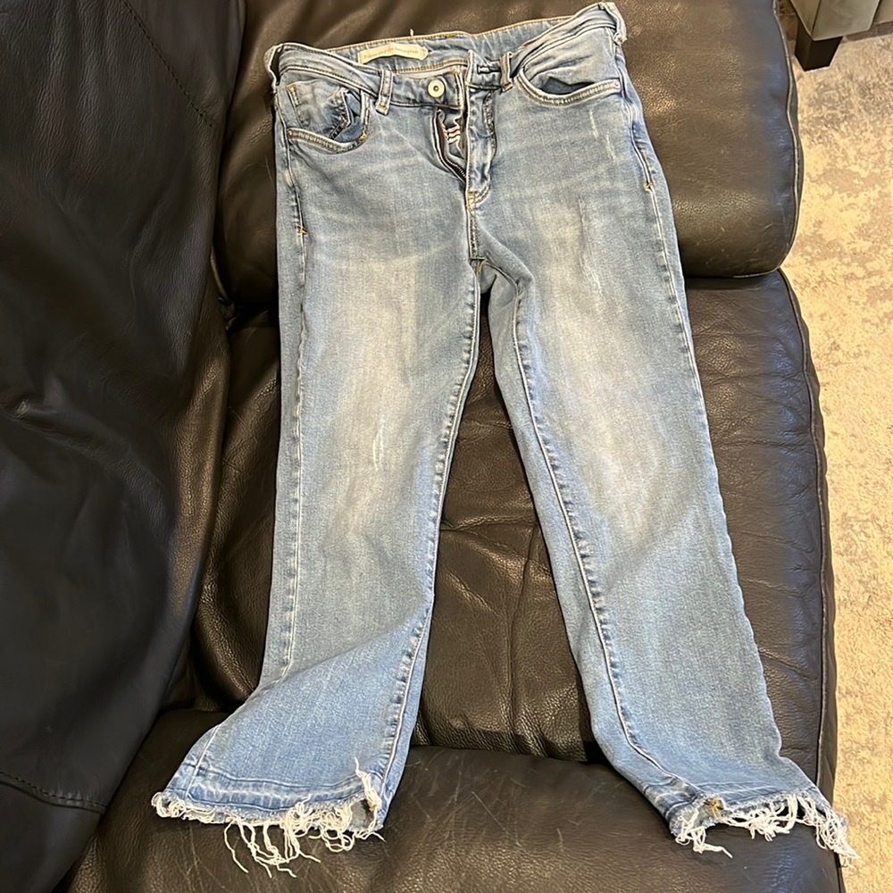 Pilcro and the letterpress cropped flare light wash denim jeans